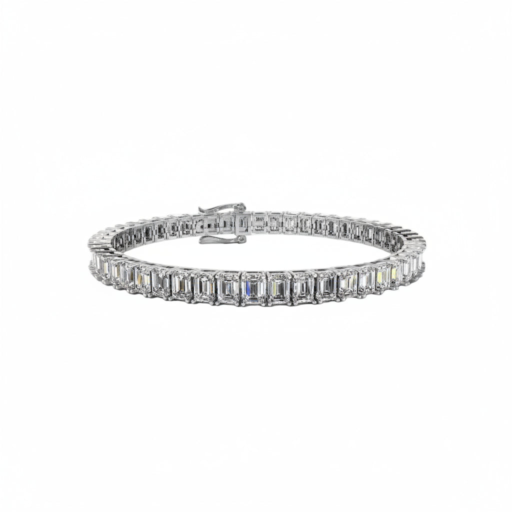 White gold Diamond bracelet with emerald-cut stones on a white background