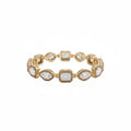 A yellow gold eternity-style bracelet featuring alternating oval and rectangular bezel-set lab grown diamonds, shown against a plain white background.