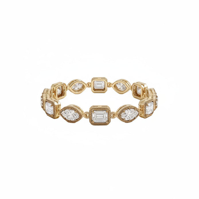 A yellow gold eternity-style bracelet featuring alternating oval and rectangular bezel-set lab grown diamonds, shown against a plain white background.