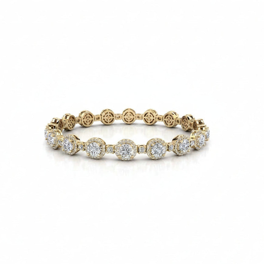 A yellow gold diamond eternity bracelet with round-cut diamonds in halo settings and patterned gold links, shown on a clean white background.