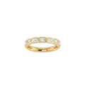 A yellow gold half eternity ring featuring a row of east-west set baguette-cut lab grown diamonds, shown on a plain white background.