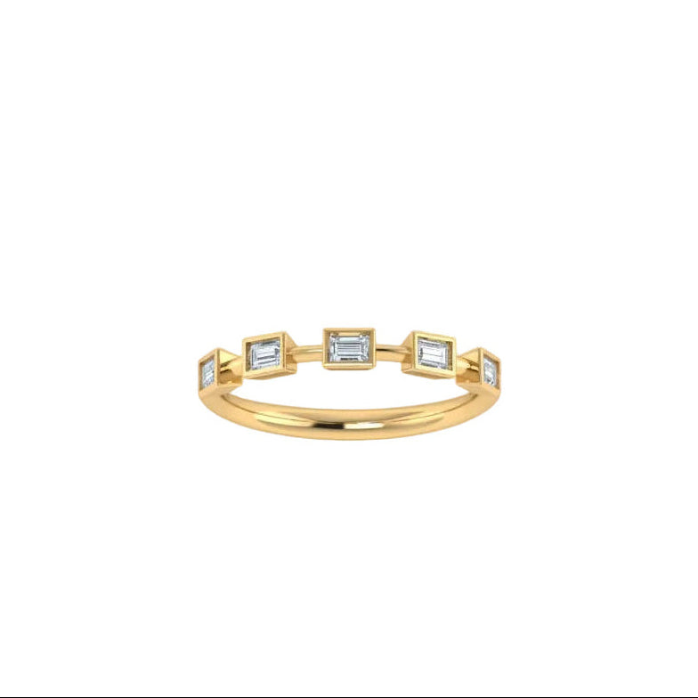 A delicate yellow gold ring featuring five s emerald-cut lab grown diamonds in spaced out setting, diamonds 1/2, photographed on a clean white background.