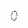 A white gold diamond eternity band ring featuring a continuous row of Heart Shaped-cut lab grown diamonds set in a polished silver-colored metal, shown against a plain white background.