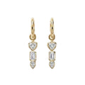 Yellow Gold bezel set drop earrings with heart and baguette cut and pear diamonds on a white background