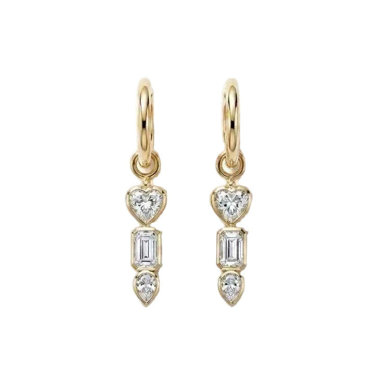 Yellow Gold bezel set drop earrings with heart and baguette cut and pear diamonds on a white background