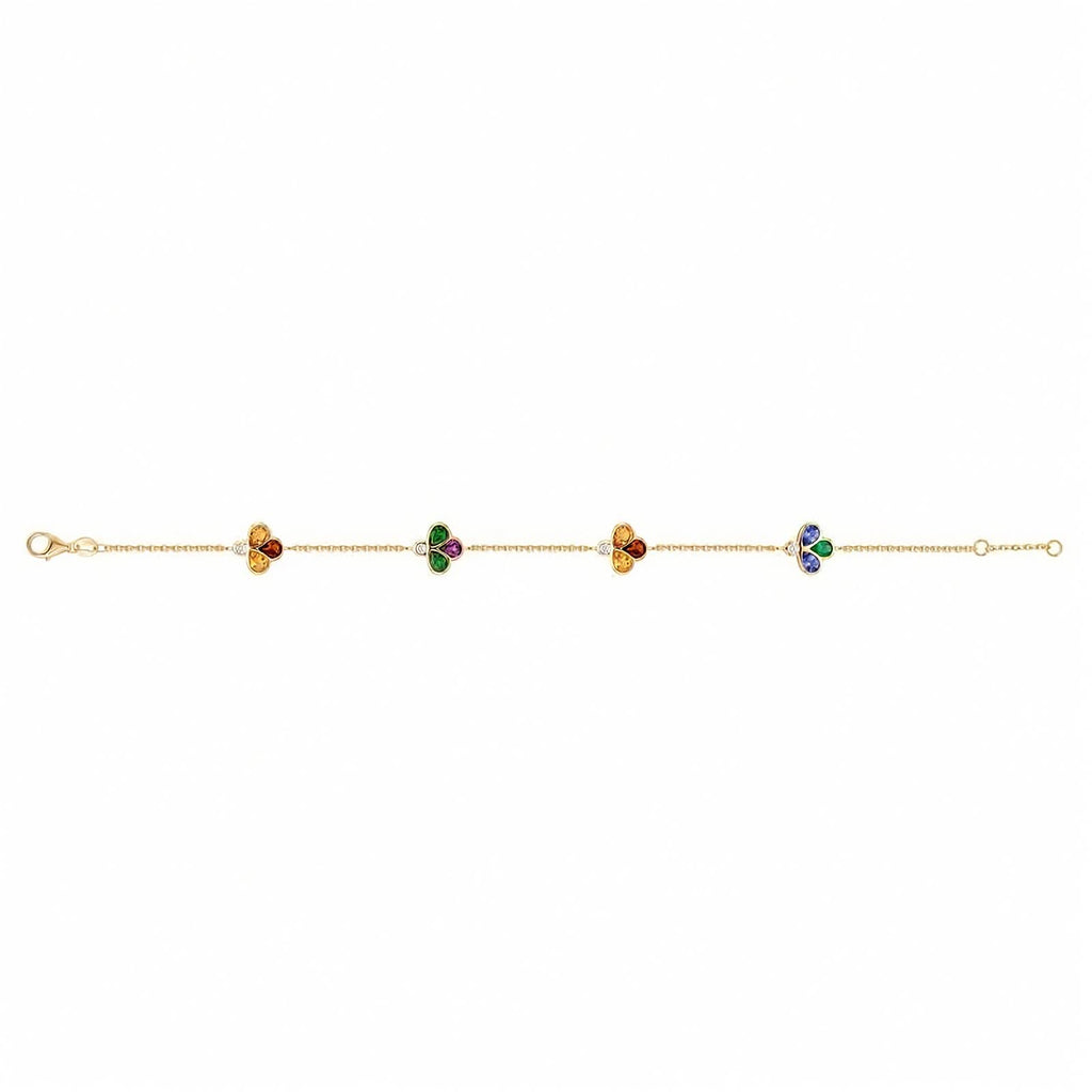 Bee 4U 18k yellow gold multi-gemstone station bracelet with tsavorite, garnet, iolite, citrine, and diamonds shown full length on a white background.