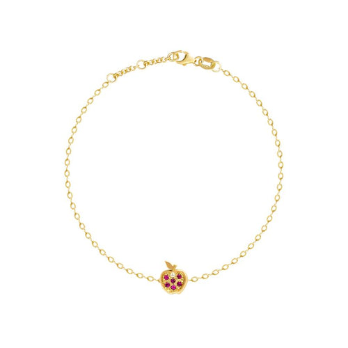 A delicate yellow gold chain bracelet with a small apple charm featuring red gemstone accents, displayed on a clean white background.