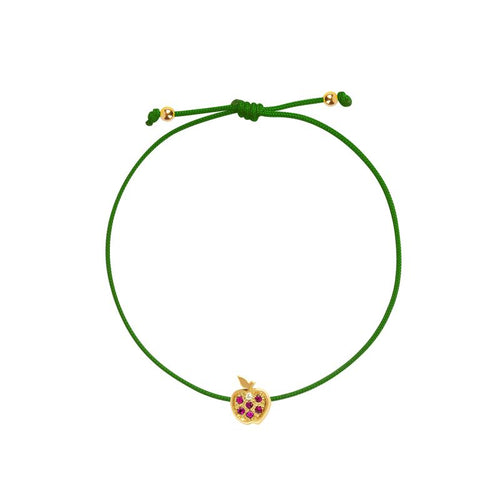 A green adjustable cord bracelet featuring a small yellow gold apple charm embellished with purple gemstones, set against a plain white background.