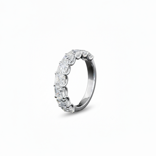 A white gold Asscher Diamond Prong set 1/2 eternity ring featuring a continuous row of asscher cut lab grown diamonds, shown on a clean white background.