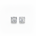 Pair of white gold asscher-shaped stud earrings on a white background