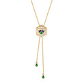 A yellow gold chain necklace with a hexagonal pendant featuring a white center, a small clear stone, three-stone clover motif in blue, green, and gold and dangly chain extension with round diamond and pear green stone.