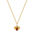 A gold chain necklace with a three-stone Bee pendant featuring a small round-cut Diamond and three larger teardrop-shaped stones in warm yellow and amber-brown shades, shown on a plain white background.