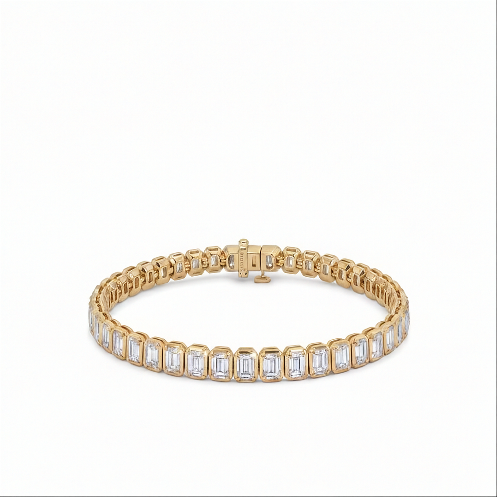 14K yellow gold bezel set emerald cut lab grown diamond tennis bracelet 9.92 ctw Inga Fine Jewelry on the white background.