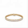 14K yellow gold bezel set emerald cut lab grown diamond tennis bracelet 9.92 ctw Inga Fine Jewelry on the white background.