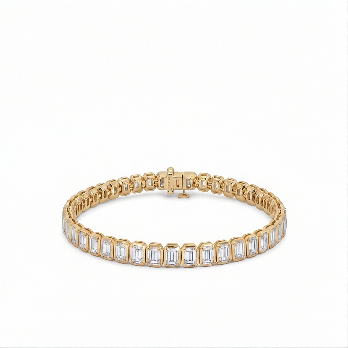 14K yellow gold bezel set emerald cut lab grown diamond tennis bracelet 9.92 ctw Inga Fine Jewelry on the white background.