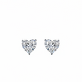 Pair of white gold heart-shaped stud earrings on a white background