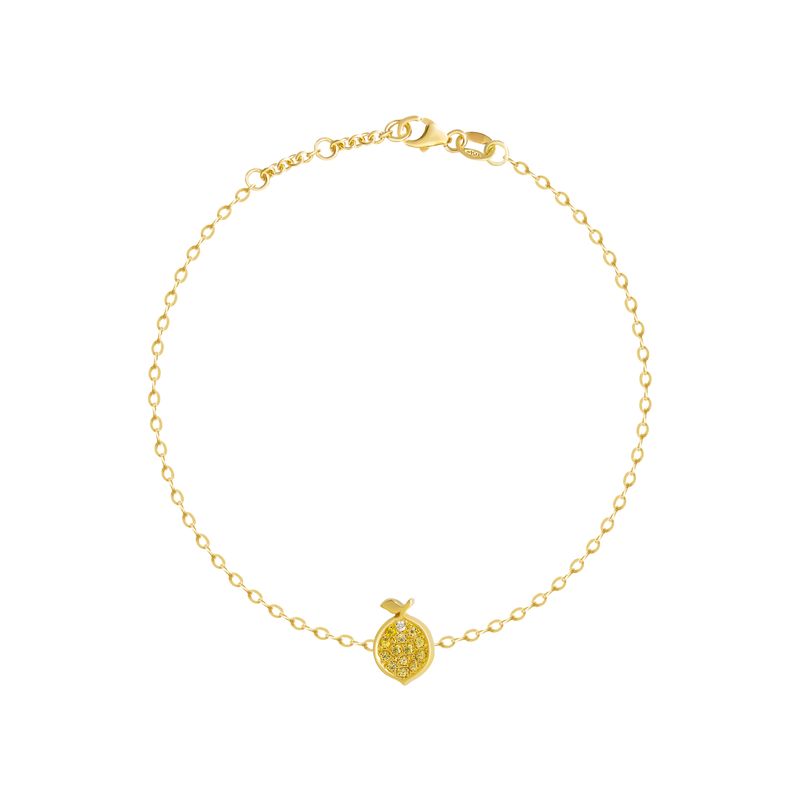 A delicate yellow gold chain bracelet with a small round pavé-set gold lemon charm, displayed on a clean white background.