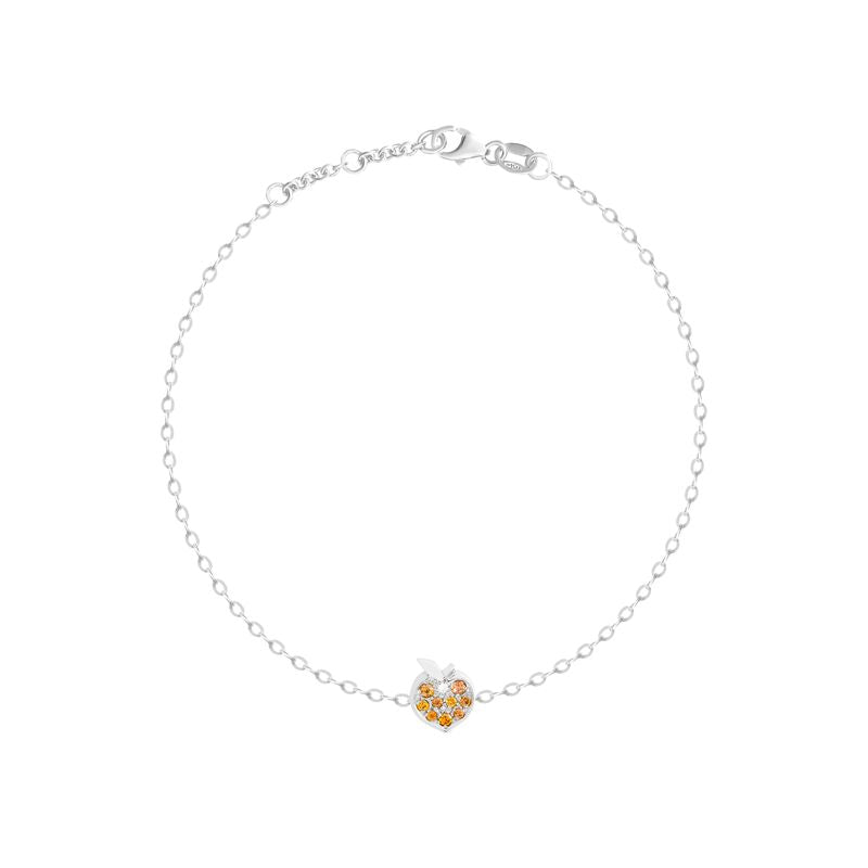 A delicate white gold chain bracelet featuring a small, textured apple-shaped charm in the center, displayed on a clean white background.