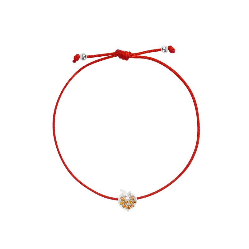 An orange adjustable cord bracelet featuring a small apple-shaped charm with white gold and orange details, displayed on a clean white background.