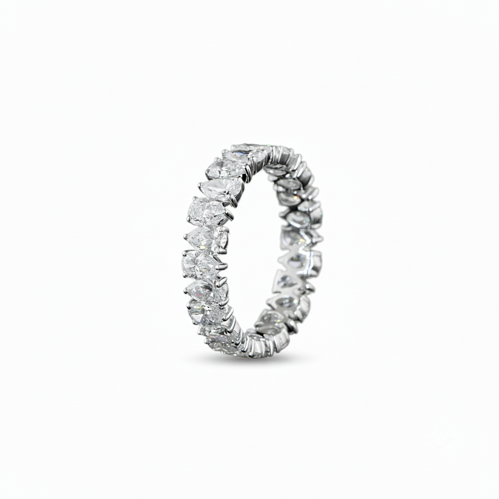 A white gold Pear Diamond Prong set full eternity ring featuring a continuous row of pear cut lab grown diamonds, shown on a clean white background.
