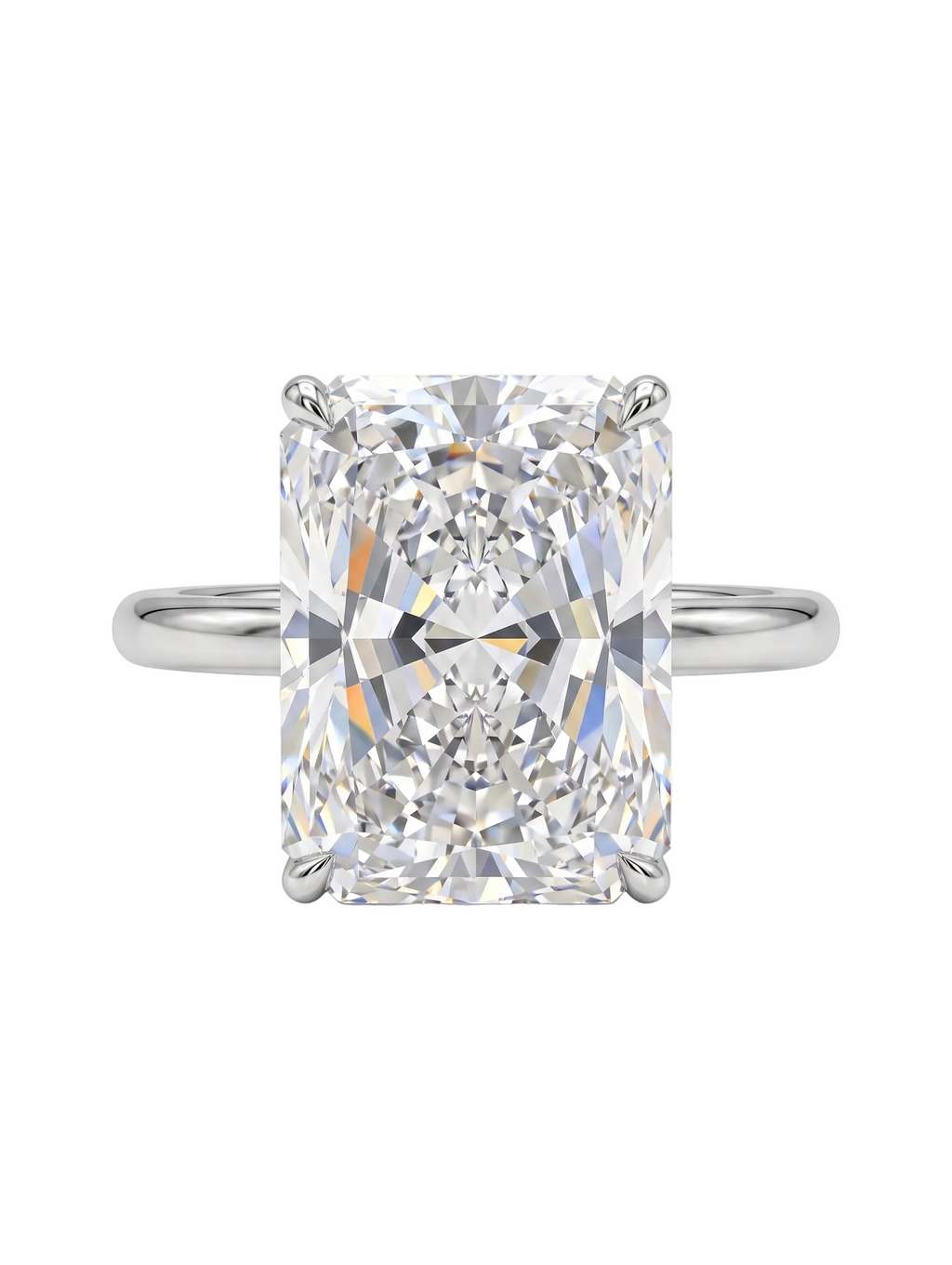 A Platinum Radiant Diamond solitaire ring featuring Radiant Center Lab Grown Diamond shown laying on a clean white background.