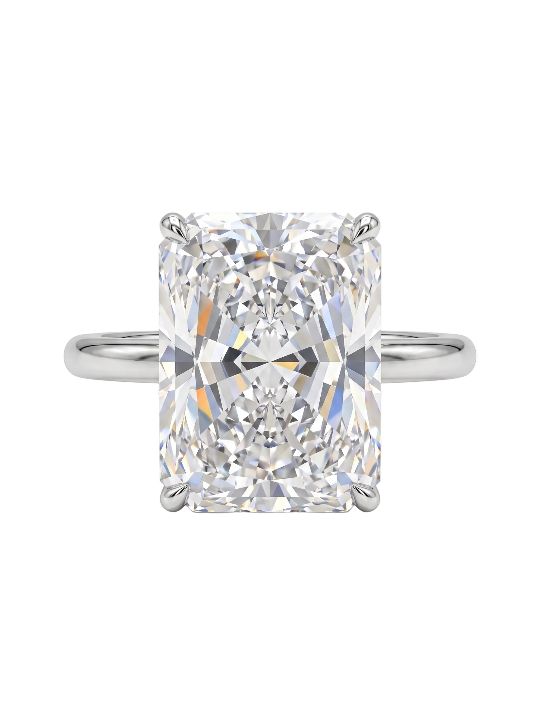 A Platinum Radiant Diamond solitaire ring featuring Radiant Center Lab Grown Diamond shown laying on a clean white background.