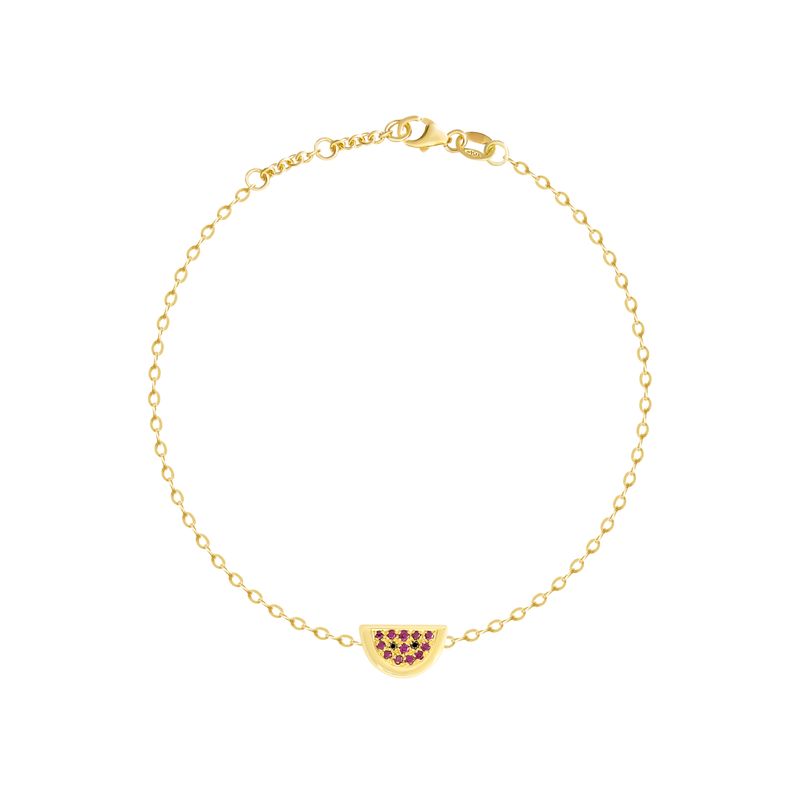 A delicate yellow gold chain bracelet with a small watermelon charm adorned with dark red gemstones, displayed on a clean white background.

