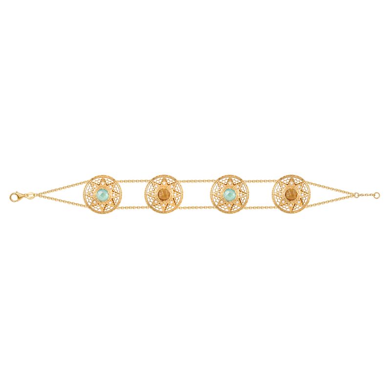 A gold chain bracelet featuring four ornate circular filigree medallions, each set with a light blue or yellow stone and a central gold bead, displayed on a clean white background.
