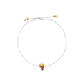 A delicate white cord bracelet featuring a small yellow gold strawberry charm adorned with red gemstones, shown on a plain white background.
