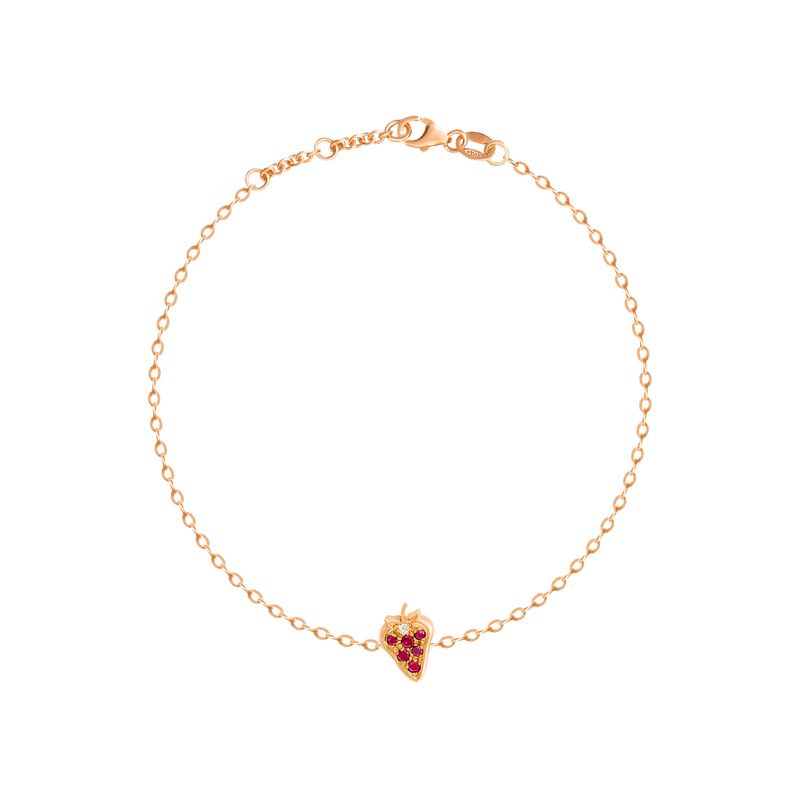 A delicate rose gold chain bracelet with a small strawberry shaped charm set with red stones, displayed on a clean white background.