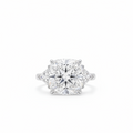 Cushion Cut Diamond And Trillion diamonds on the side - Three Stone Ring in White Gold on a white background.