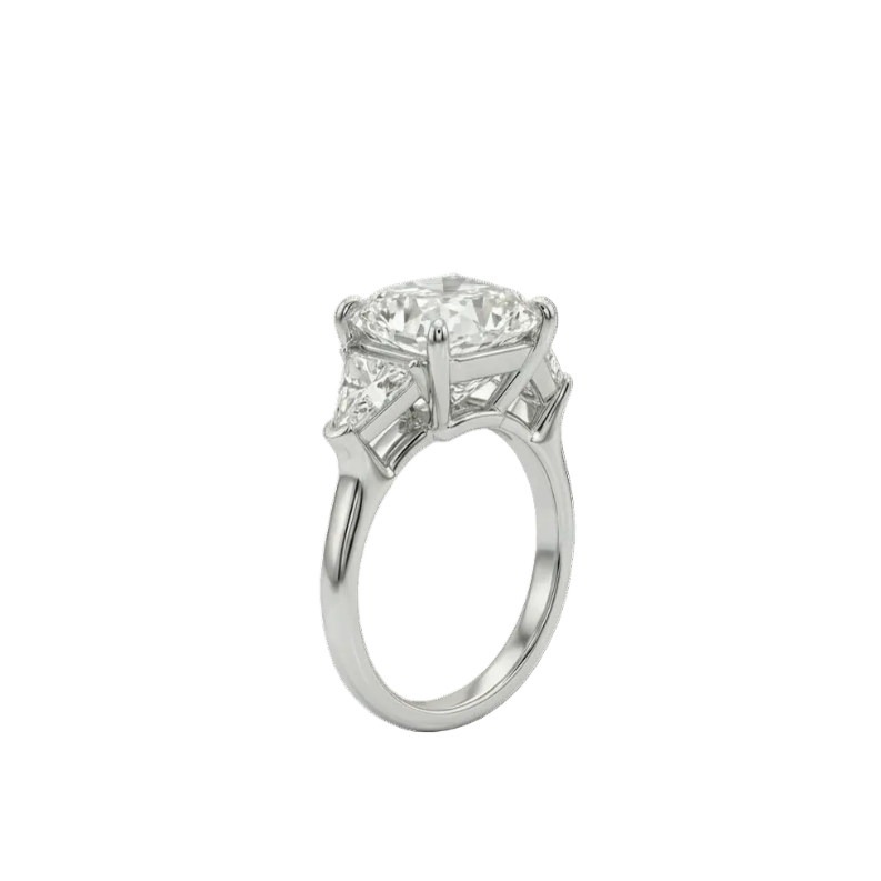 Cushion Cut Diamond And Trillion diamonds on the side - Three Stone Ring in White Gold on a white background.