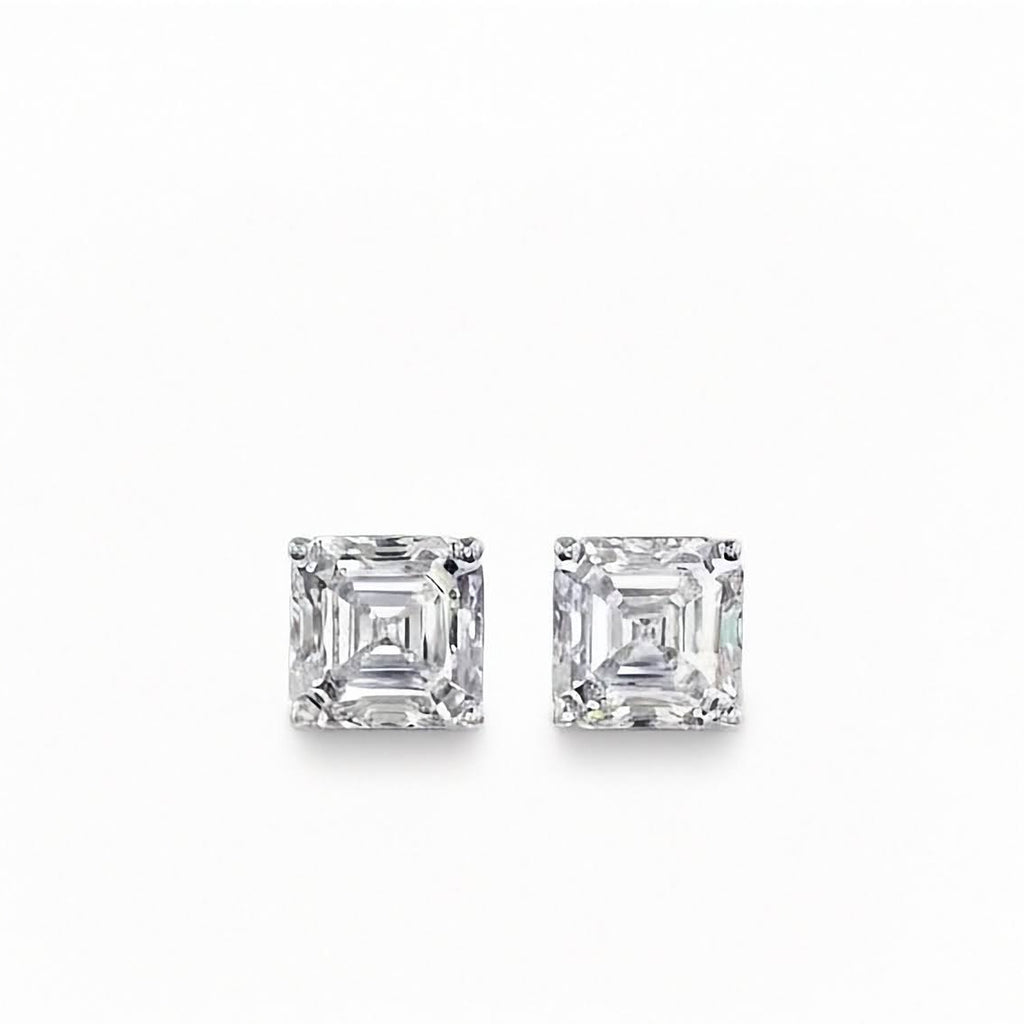 A pair of Inga Fine Jewelry Asscher Cut Diamond Stud Earrings in 14k White Gold 1.54ctw Lab Grown shown in white background.
