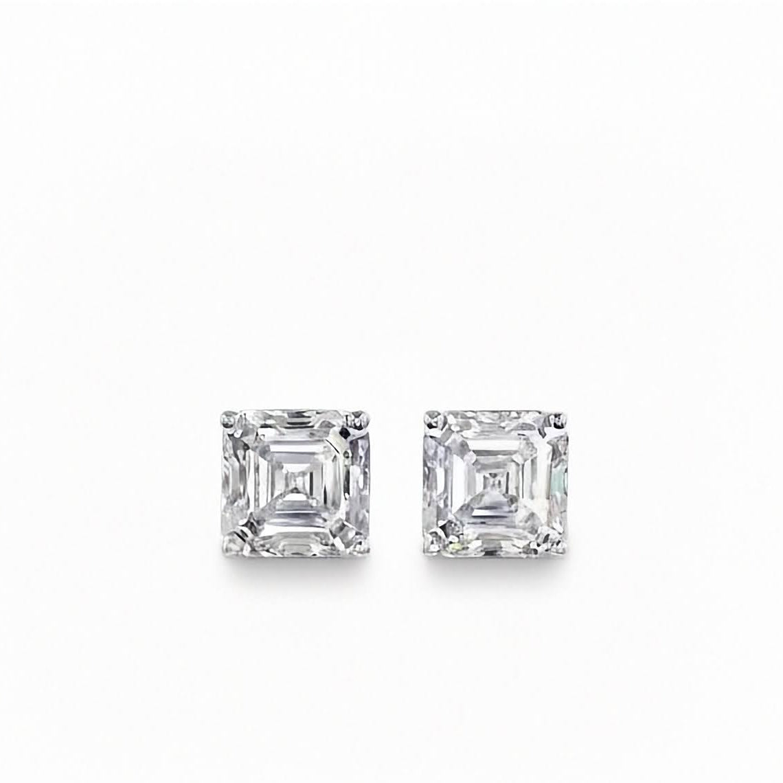 A pair of Inga Fine Jewelry Asscher Cut Diamond Stud Earrings in 14k White Gold 1.54ctw Lab Grown shown in white background.
