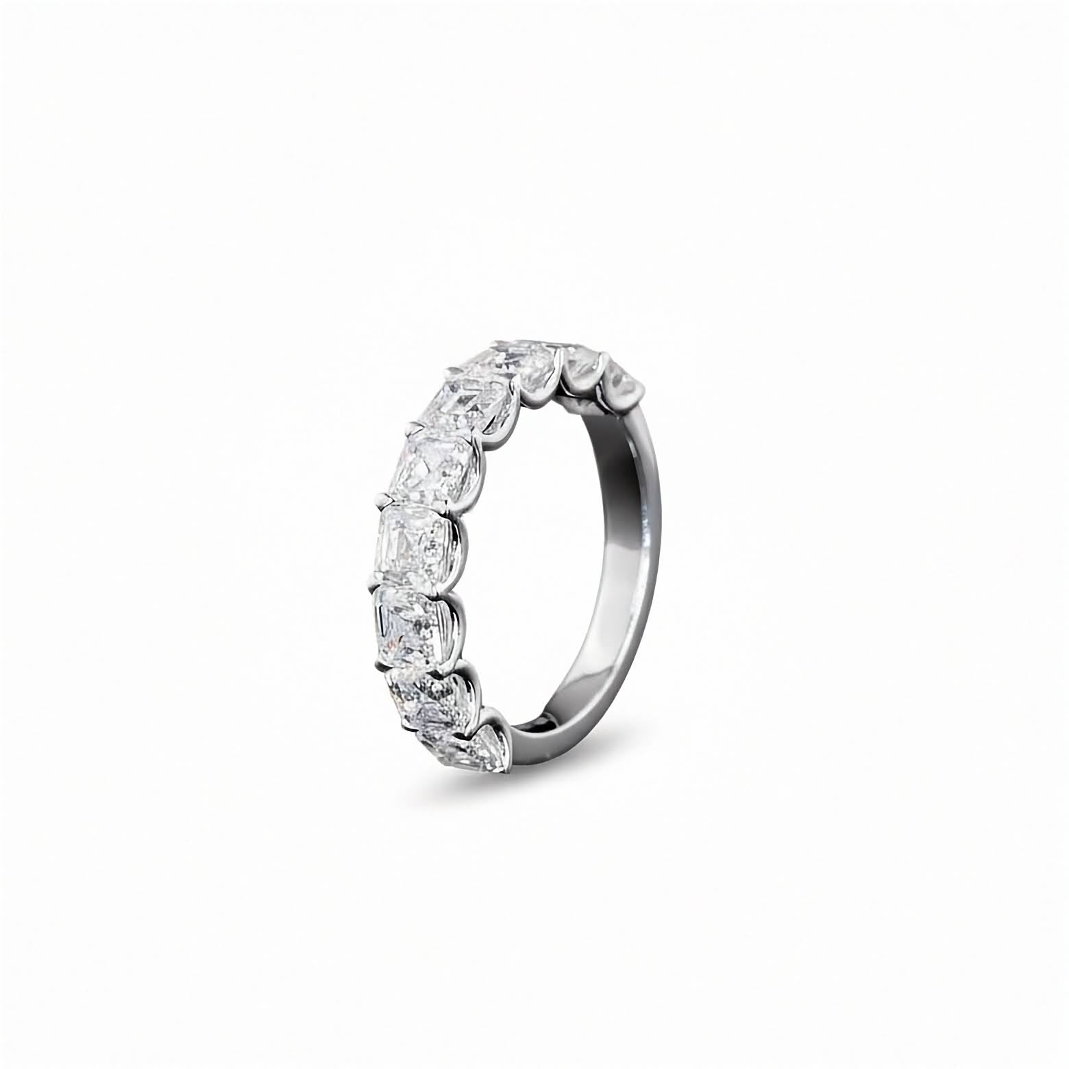 A white gold Asscher Diamond Prong set 1/2 eternity ring featuring a continuous row of asscher cut lab grown diamonds, shown on a clean white background.