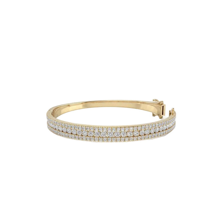 Yellow Gold Pave set Diamond bangle in a white background