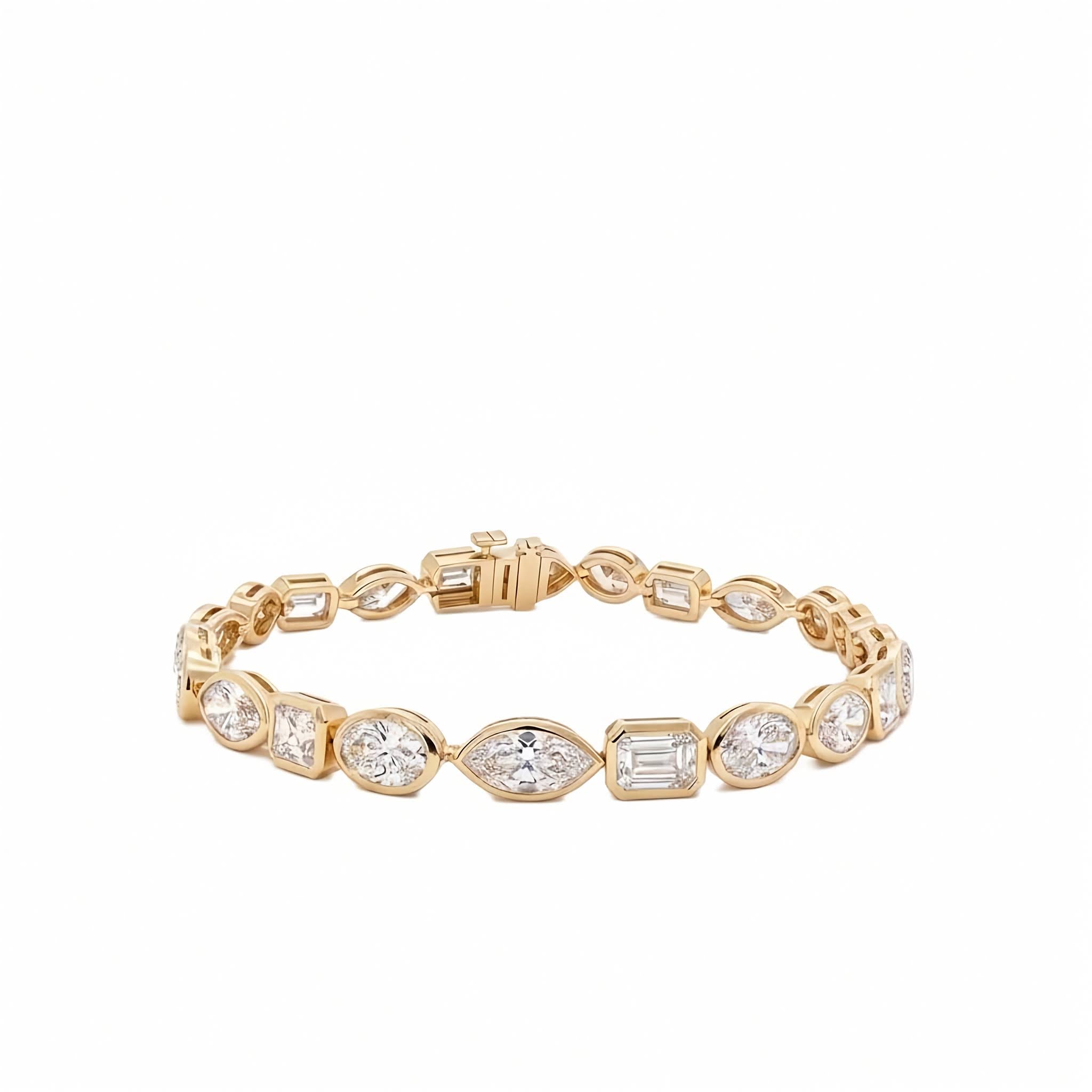 10.25 ctw mixed shape bezel set lab diamond tennis bracelet in 14k yellow gold with oval, marquise, and emerald cut diamonds on a white background. 
