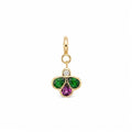 A yellow gold charm pendant featuring a three-petal bee design with a green gemstones on the left and right, a purple pear-cut stone in the center, and a small clear round-cut diamond at the top, set in a polished gold bezel with a hanging loop.
