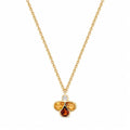 Bee The One 18k yellow gold necklace with citrine quartz, garnet, and diamond shown on a plain white background.