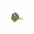 A gold hexagonal ring featuring green enamel inlay, a central green and purple clover motif, and a small clear gemstone, shown on a plain white background.