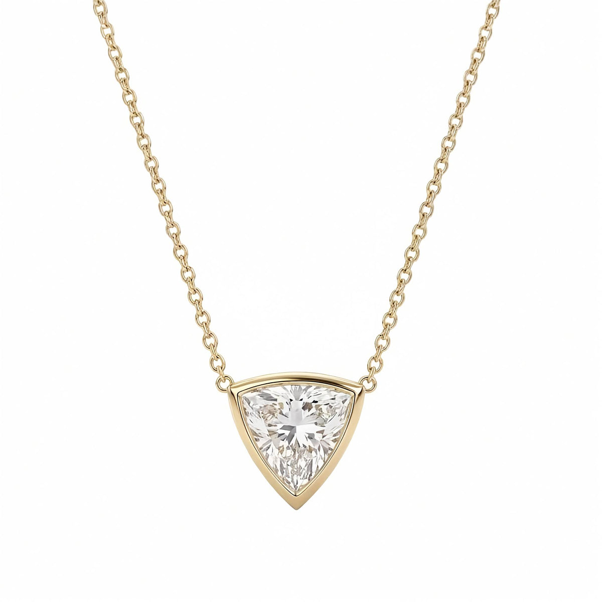 18k yellow gold 3.19ct trilliant cut lab diamond bezel pendant on 18 inch chain. A yellow gold necklace with a delicate chain and a triangular pendant featuring a clear trilliant - cut diamond, shown against a plain white background.