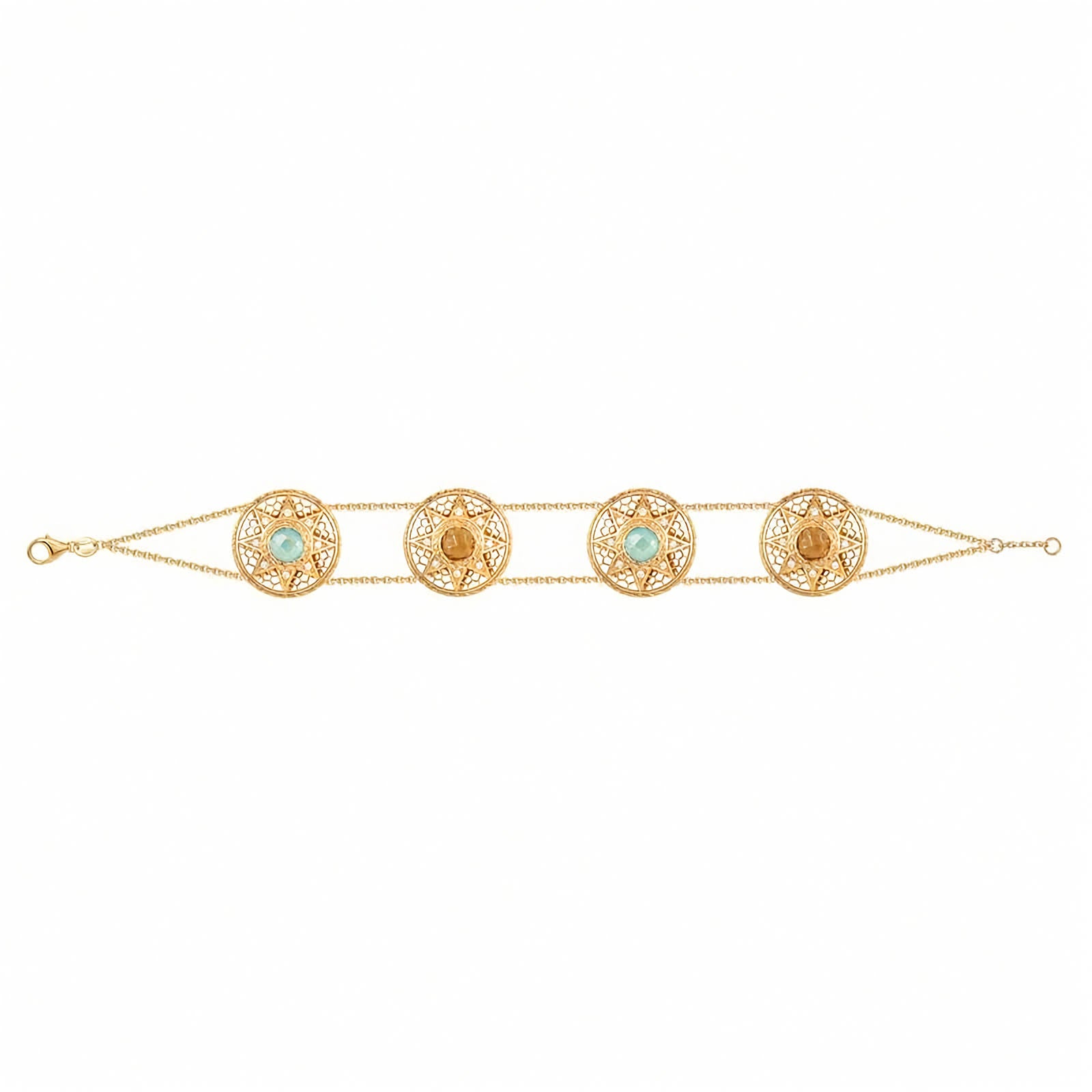 A gold chain bracelet featuring four ornate circular filigree medallions, each set with a light blue or yellow stone and a central gold bead, displayed on a clean white background.
