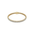 Yellow Gold bracelet with diamonds on a white background