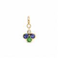 A yellow gold charm pendant featuring three flower-like stones in blue, green gemstones with a small clear round diamond above them, set against a plain white background.