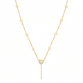 14K yellow gold heart diamond lariat necklace with bezel set station diamonds and pave drop bar on white background.