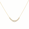 14K yellow gold curved bar necklace with center oval diamond and graduated pear diamonds by Inga Fine Jewelry on white background.