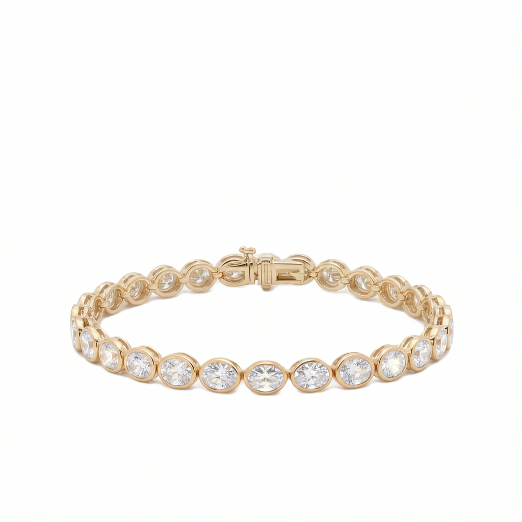 14K yellow gold bezel set oval lab grown diamond tennis bracelet 10.70 ctw Inga Fine Jewelry on white background.
