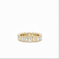 14K yellow gold bezel set emerald cut lab grown diamond eternity band ring 2.67 ctw Inga Fine Jewelry on white background.