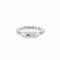 A Platinum band ring featuring a row of baguette-cut lab grown diamonds, shown against a plain white background.