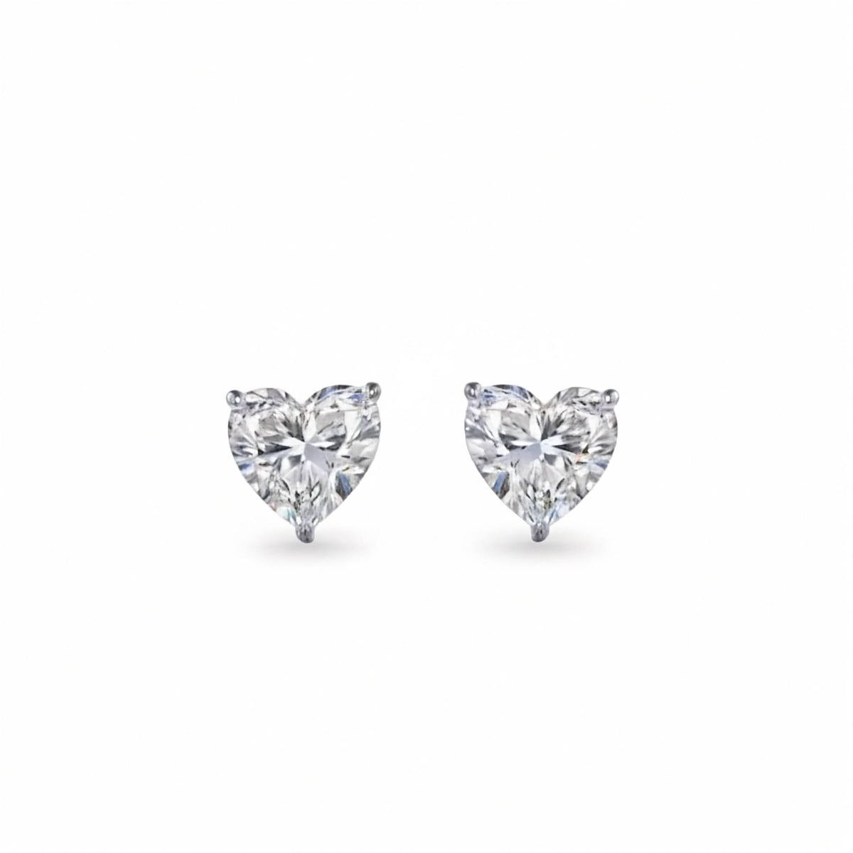 2ct Heart-Cut Lab-Grown Diamond Stud Earrings in 14k White Gold on white background.